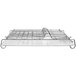 An OXO stainless steel folding dish rack with two metal racks on it.