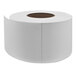 A roll of white paper with a brown lid.