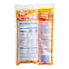 A white Pop Weaver All-In-One Naks Pak Butter Burst popcorn kit with a label.