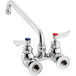 A silver Waterloo wall-mounted faucet with silver knobs.