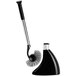 A black and silver simplehuman toilet brush in a metal stand.