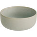 An Acopa Pangea white porcelain bowl with a gray rim.