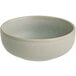 An Acopa Pangea porcelain nappie bowl with a gray rim.