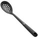 An OXO Good Grips black nylon perforated spoon.