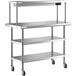 A stainless steel Regency expeditor table with shelves on wheels.