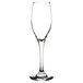 A close-up of a clear Libbey Perception flute glass with a thin stem.