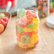 A clear PET jar filled with colorful gummy candies.