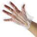 A hand in a clear plastic AeroGlove.