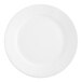 A close-up of an Acopa bright white stoneware plate with a wide white rim.