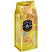 A close up of a Lavazza Tierra! Colombia coffee bag with a yellow label.