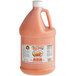 A gallon jug of orange Marie Sharp's Hot Habanero hot sauce.