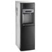 A black and white Follett water cooler with a water dispenser.