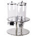 A Tablecraft stainless steel triple canister cereal dispenser on a silver stand.