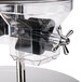 A Tablecraft stainless steel triple canister cereal dispenser.