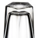 A close up of a Libbey Inverness clear beverage glass with a triangular top.