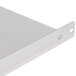 A silver metal Manitowoc bin adapter kit shelf with a hole in the middle.