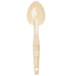 A beige plastic Cambro salad bar spoon with a handle.