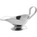 A silver stainless steel gravy boat with a handle.