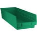 A Regency green plastic shelf bin.