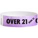 A light purple Carnival King paper wristband with black text that says "OVER 21"