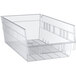 A clear plastic Regency shelf bin with two compartments.