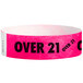 A close-up of a pink Carnival King wristband with the words "OVER 21" on it.