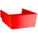 A red plastic Regency shelf bin.