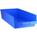 A Regency blue plastic shelf bin.