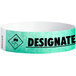 A green Carnival King wristband with the word "DESIGNATED DRIVER" on it.