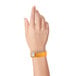 Carnival King Neon Orange Disposable Vinyl Wristband 3/4" x 10" - 500/Box Main Thumbnail 3