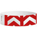 A white paper wristband with red chevron stripes.