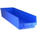 A Regency blue plastic shelf bin.