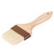 A 3" wide Boar Bristle Pastry / Basting Brush with a wooden handle.