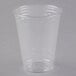 A Dart clear plastic cup on a white background.