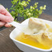 Acopa 0.6 oz. Bright White Ceramic Chinese Soup Spoon / Asian Wonton Soup Spoon - 12/Pack Main Thumbnail 4