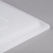 A white Rubbermaid polyethylene lid on a white surface.
