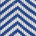 A close up of a blue and white woven fabric on a white background.