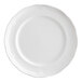 A white porcelain plate with a scalloped wide rim.