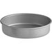 A round silver Baker's Mark cake pan.