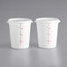 Two white Choice food storage containers with red measurements.