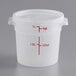A white translucent plastic food storage container with red measurements on it.