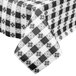 A 52" wide black and white checkered vinyl table cover.