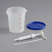 A white plastic container with a blue lid and white pump syringe.