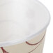 A white Solo Symphony foam cup with a brown design on it.