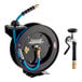 A white powder-coated steel Regency hose reel with a black and blue hose and a black hose clamp.