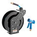 A black powder-coated steel Regency hose reel with a hose and a blue front trigger water gun.