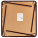 A Flash Furniture brown square folding card table with metal legs.
