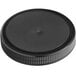 A 70/400 black plastic cap with foam liner on a table.