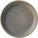 A Dudson Evo matte granite stoneware olive/tapas dish with a speckled pattern on a gray plate.