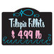 A rectangular black chalkboard deli tag with blue and pink text.